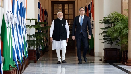 india mitsotakis.jpg